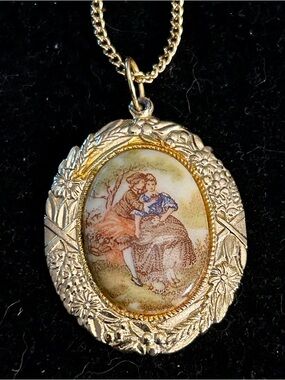 “Courting Couple” Hand-painted porcelain cameo necklace .  Vintage